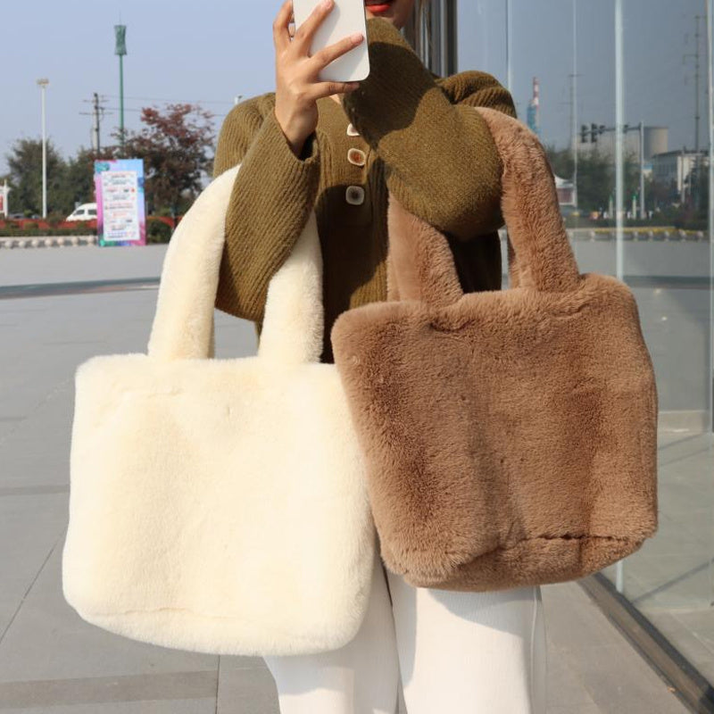 Women's fluffy faux fur tote bag front view with structured silhouette