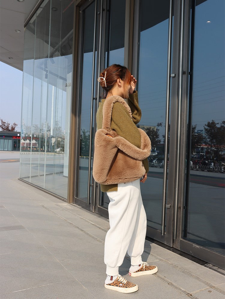 Soft faux fur tote bag for women styled as an autumn winter everyday bag
