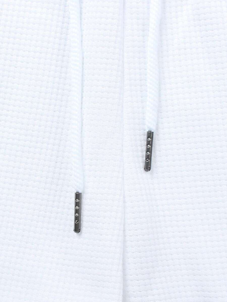 Textured men's polo set styled for warm-weather everyday wear with a unified matching look