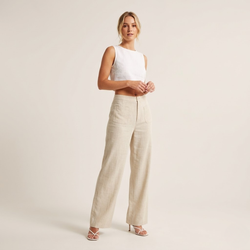High-waist straight-leg pants with front button and zipper closure, full-length silhouette