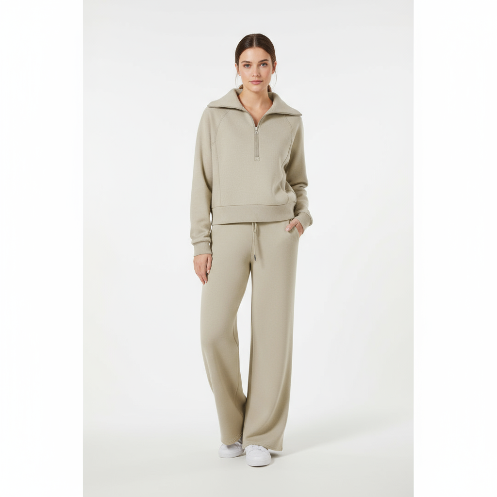 Women's stretch knit loungewear set with half-zip sweater and wide-leg trousers, three-quarter view