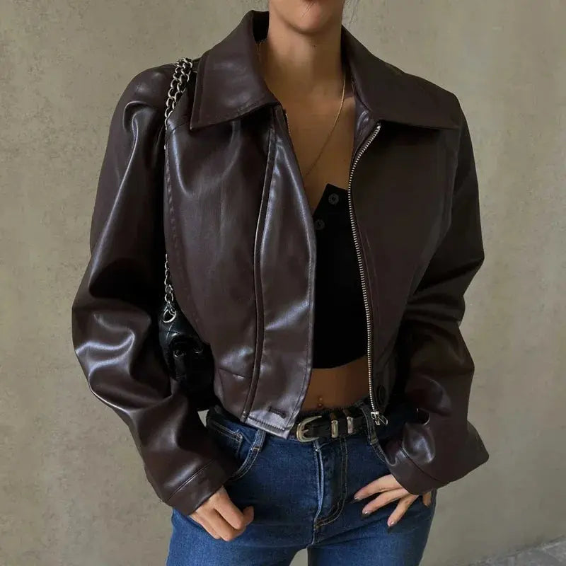 Short faux leather jacket for women with structured silhouette and smooth surface
