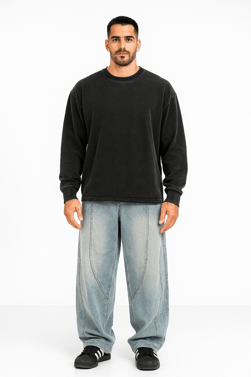 Men's wide-leg panel jeans with structured denim fabric and washed finish