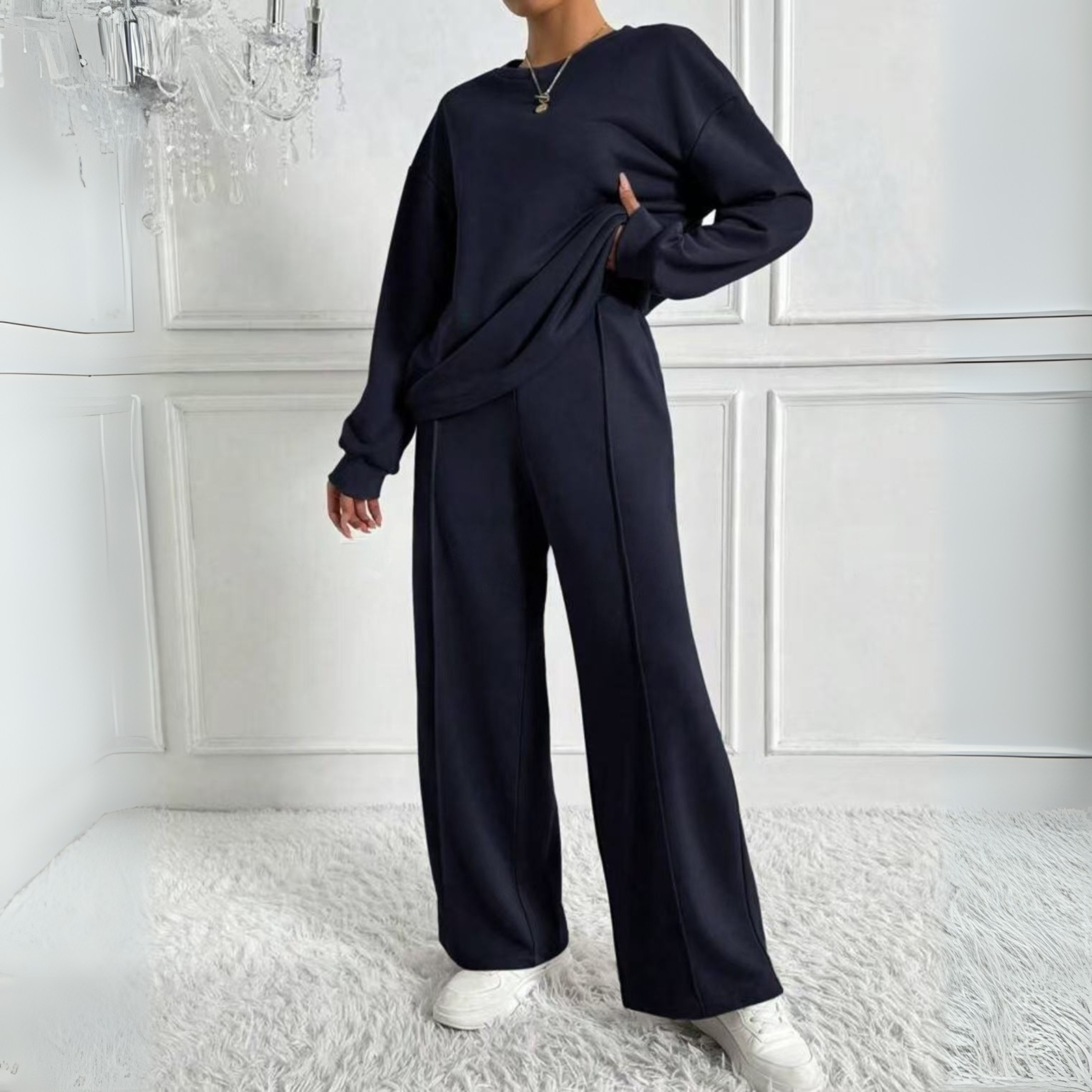Women's relaxed-fit two-piece set featuring a long-sleeve top and full-length wide-leg trousers in polyester
