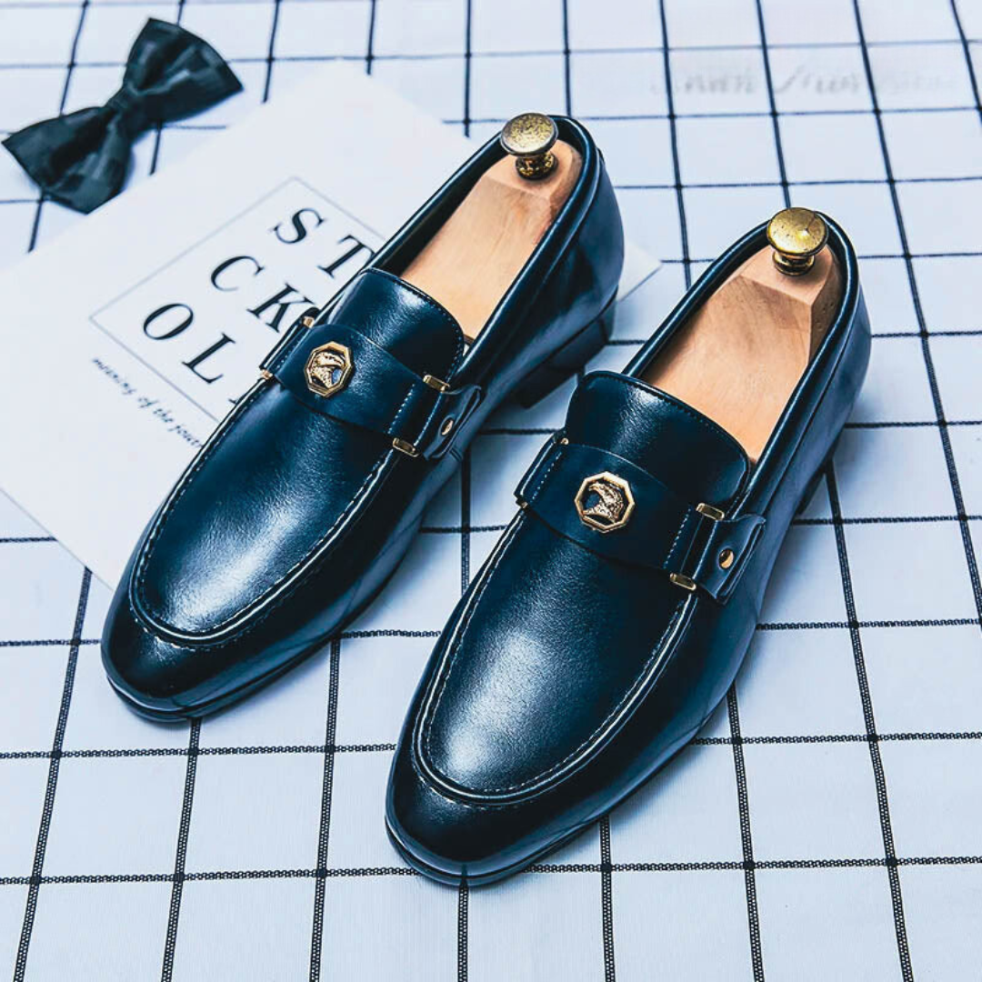 Men's slip-on leather loafers with strap detail and flat outsole