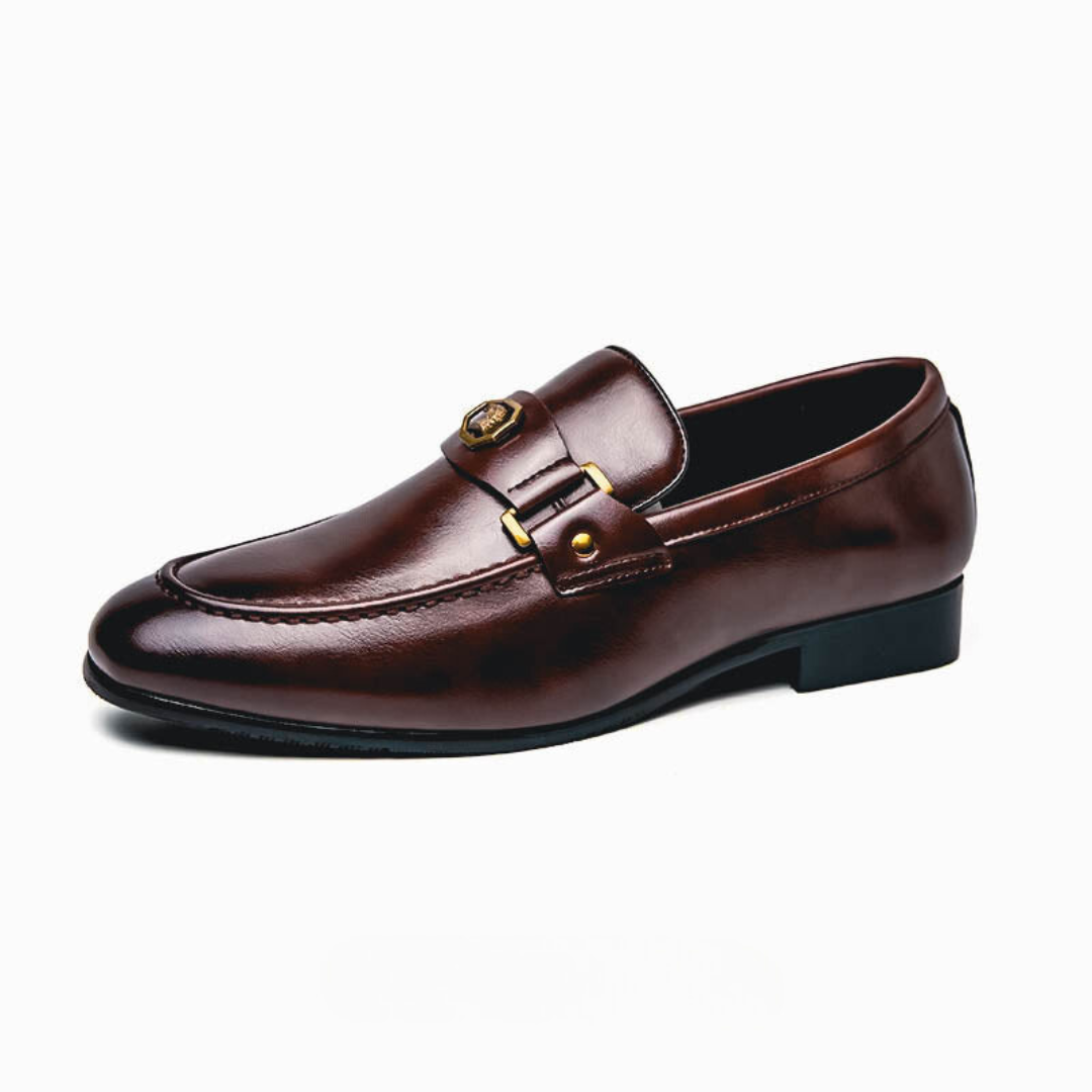 Men's leather loafers with strap, low heel, and round toe silhouette