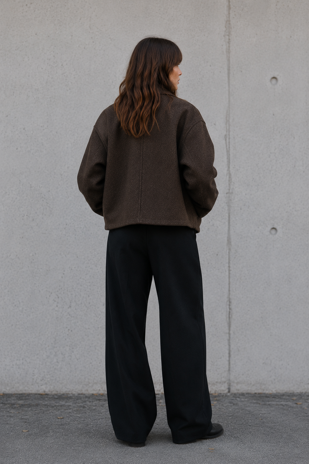 Short wool-blend women's jacket with clean construction and classic collar detail