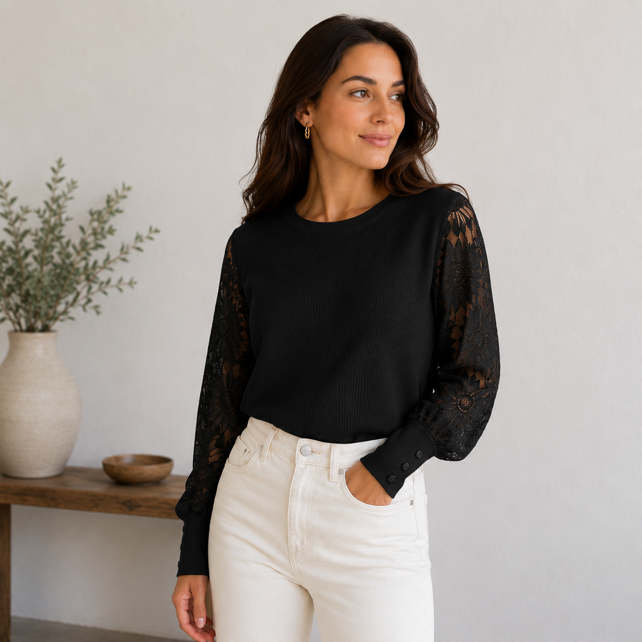 Women's fitted lace sleeve blouse with textured knit body, buttoned cuffs, and straight hem