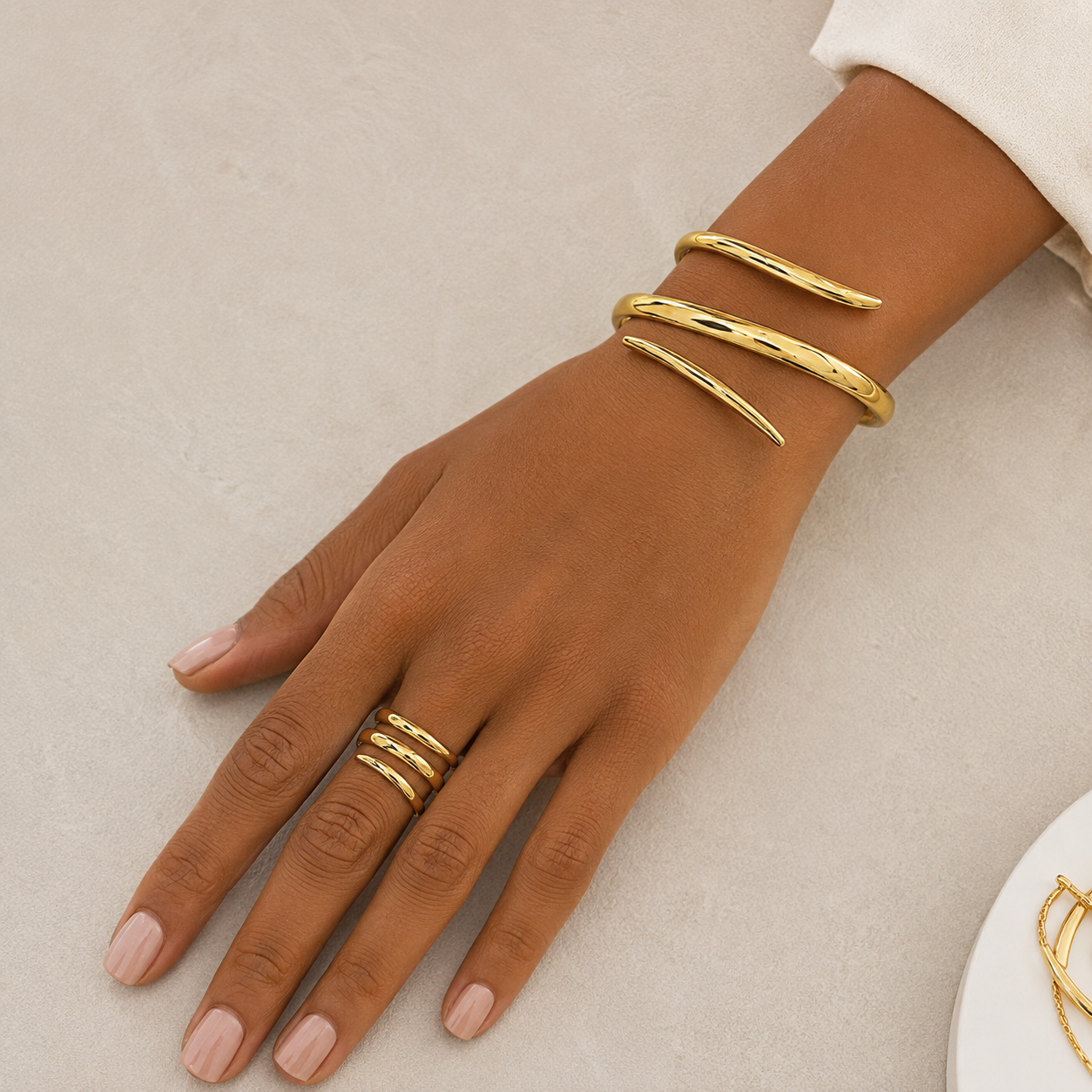 Women's metal alloy jewelry set featuring a matching bracelet and open-band ring
