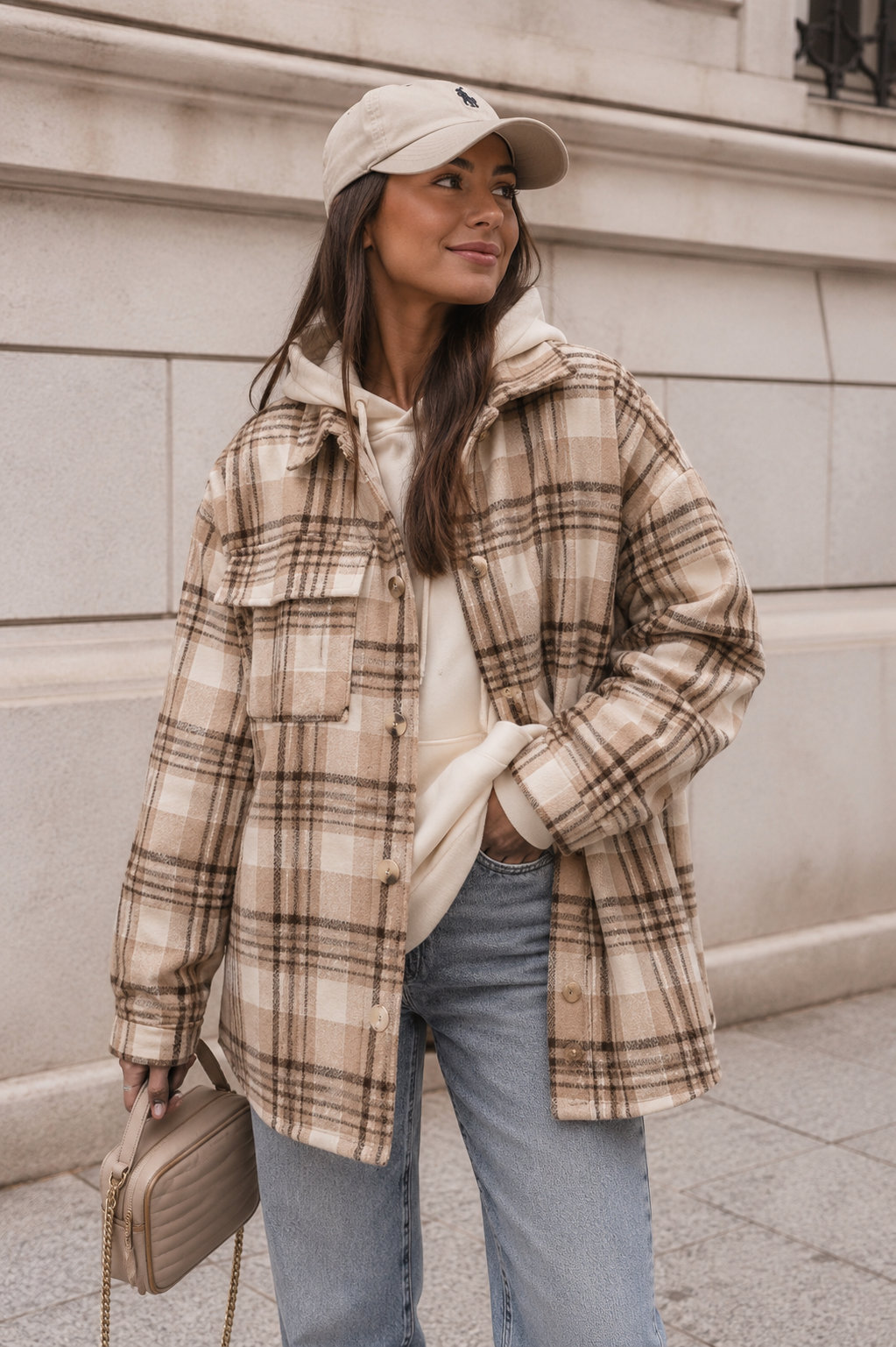 Women's plaid overshirt jacket with button closure and shirt collar, relaxed fit front view