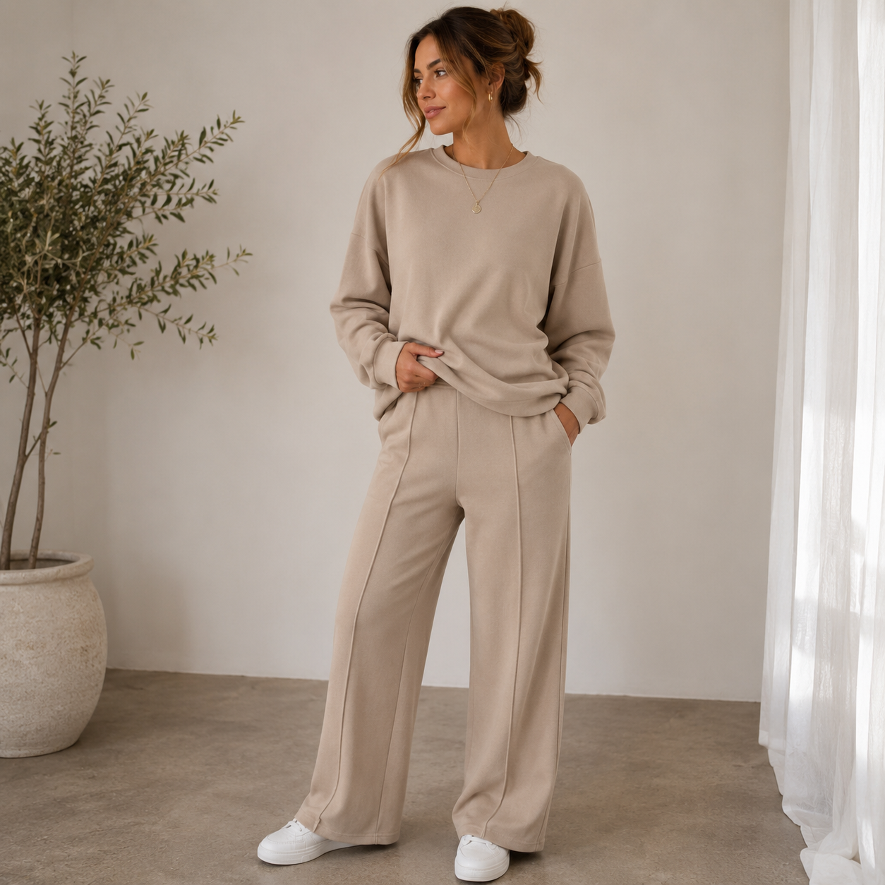 Women's matching long-sleeve sweater and wide-leg trousers set with elastic waist in polyester