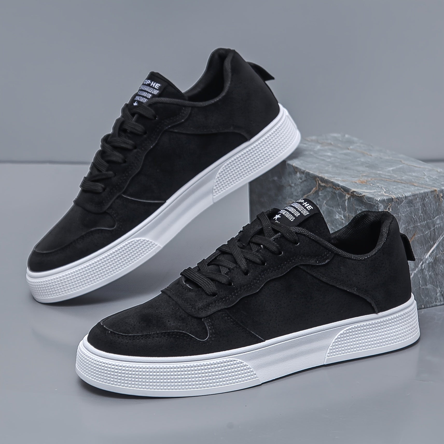Men's canvas sneakers shown from a three-quarter front angle