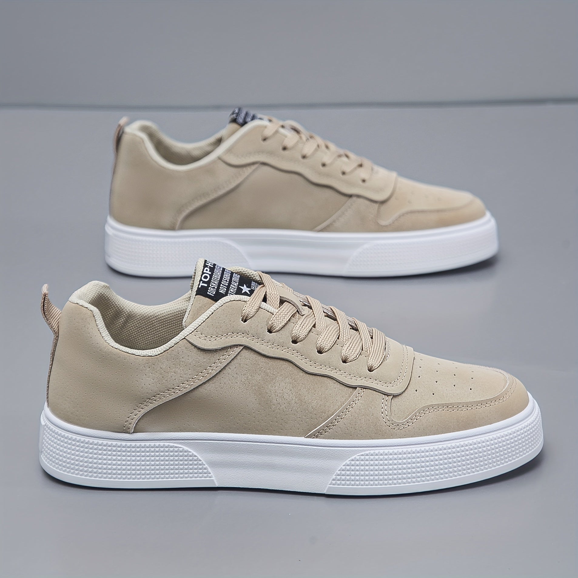 Men's canvas sneakers pair displayed flat lay, showing full silhouette