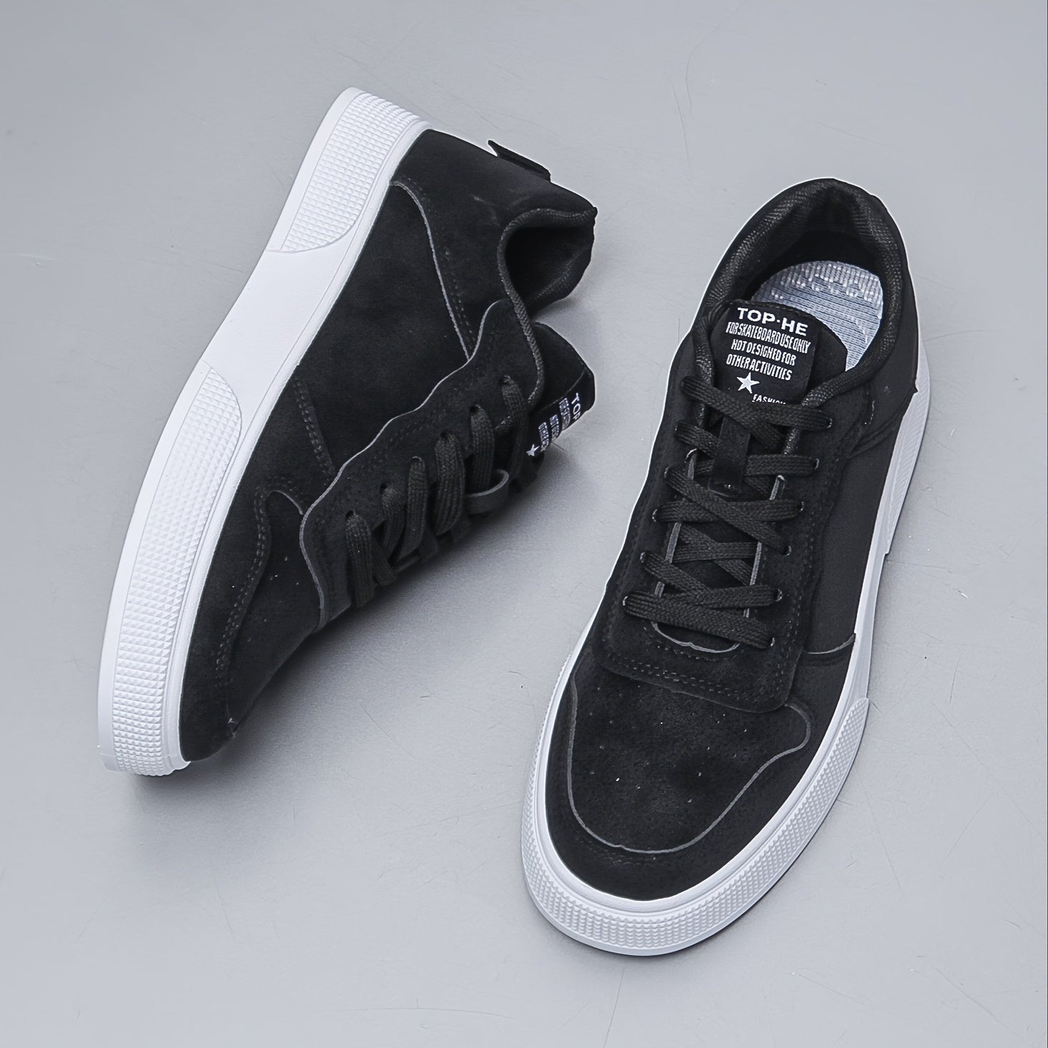 Top-down view of men's canvas sneakers displaying lace-up detail