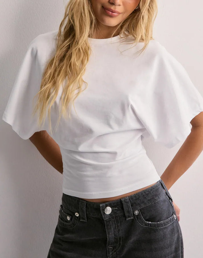 Short-sleeve draped women's top with fitted waist and structured bodice