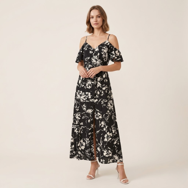 Women's floral maxi dress with cold-shoulder design, adjustable straps, and flowing silhouette