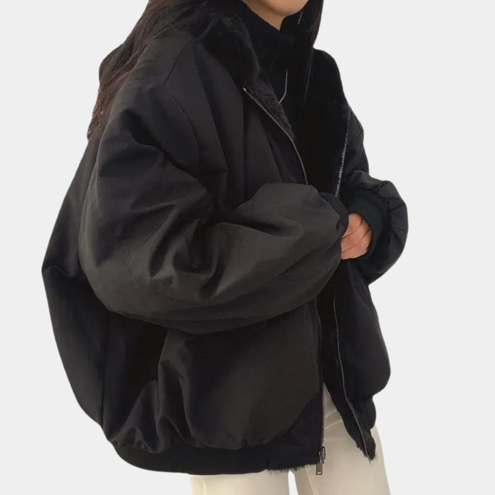 Oversized women's jacket with soft faux fur interior lining, side profile view