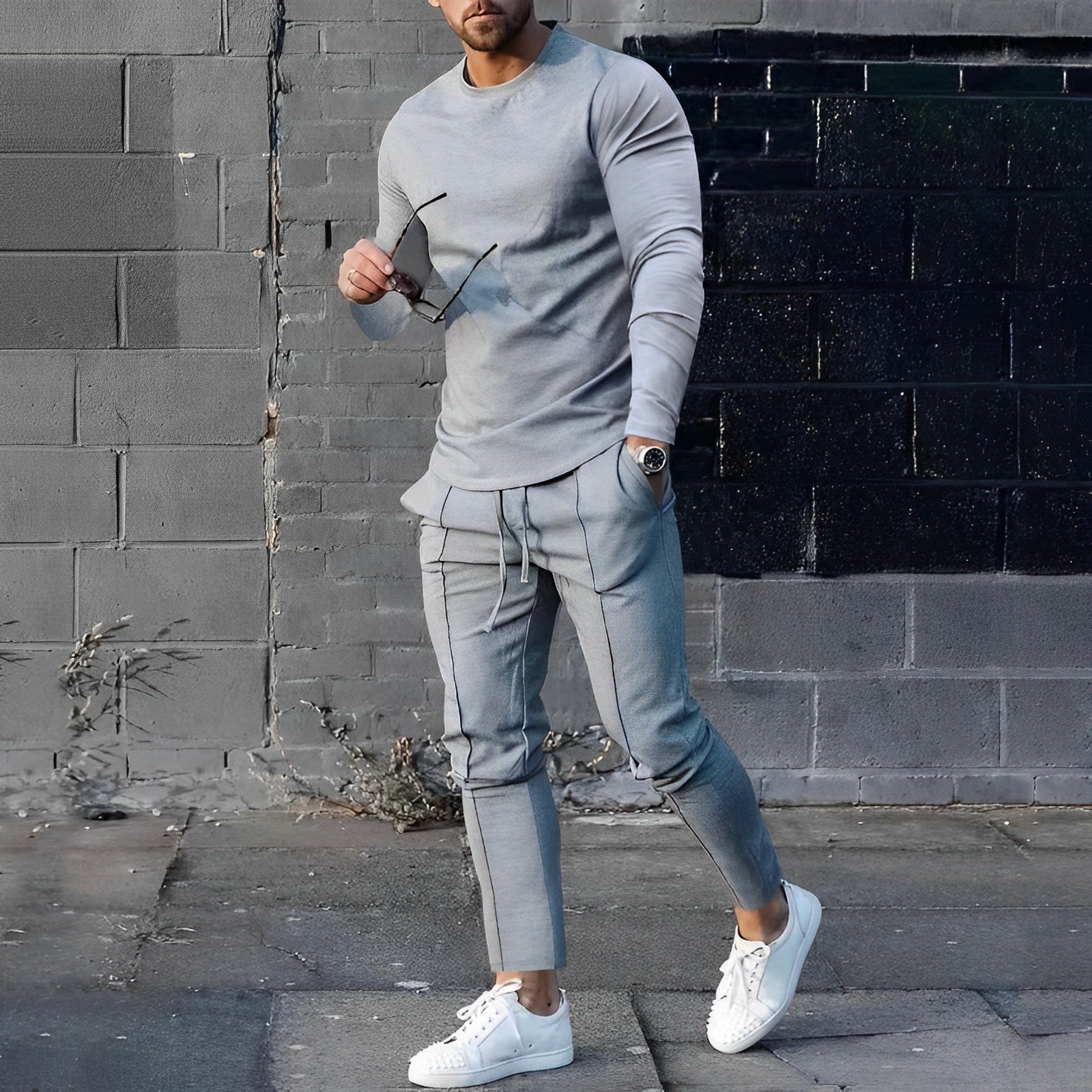 Men's training set back view — long-sleeve top and drawstring joggers in black cotton blend