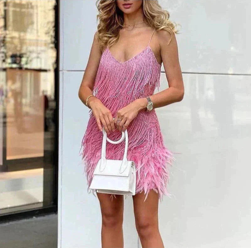 Women's fitted fringe mini dress with feather bottom trim and V-neckline, mini silhouette