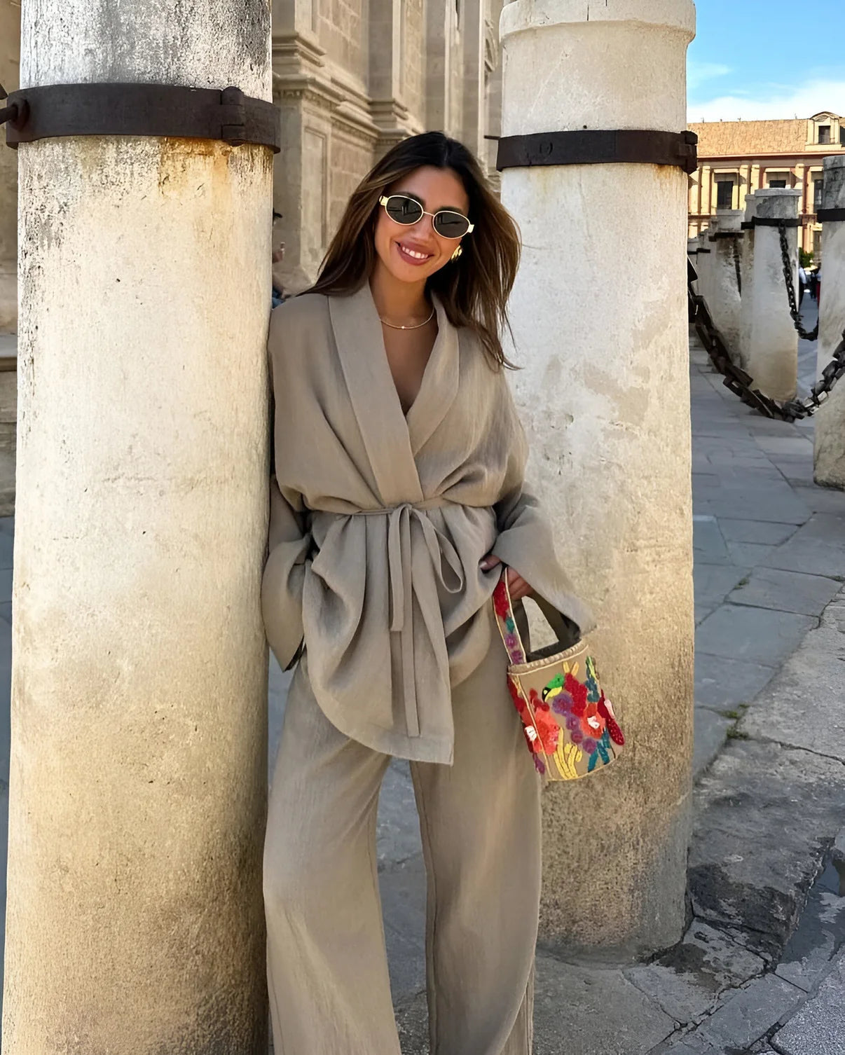 Women's two-piece set with wrap blouse and wide-leg trousers in lightweight woven fabric