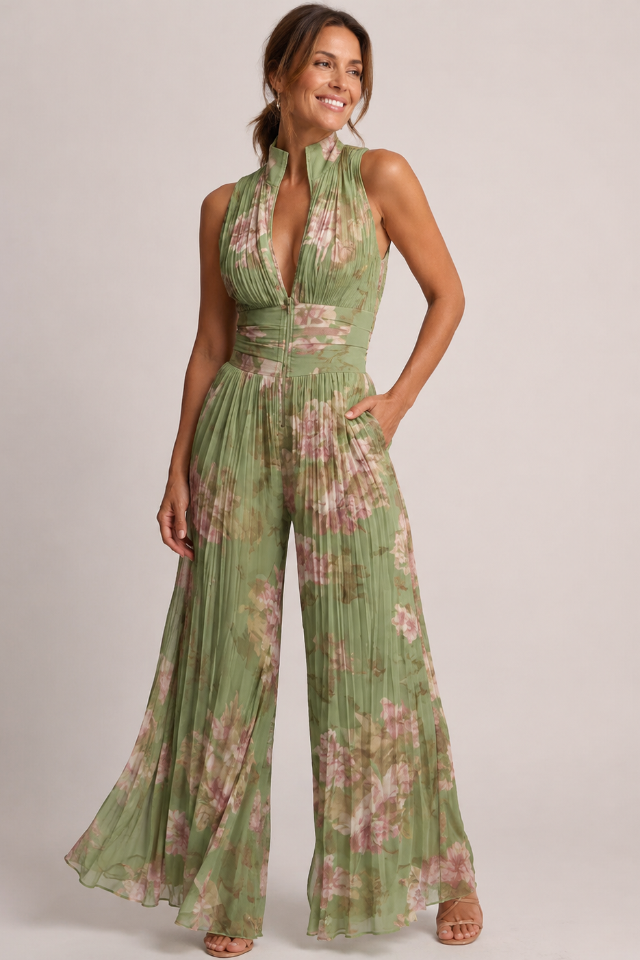 Front view of floral pleated wide leg jumpsuit