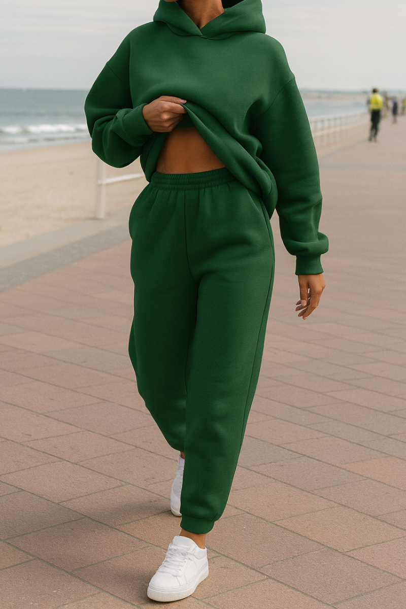 Women's two-piece hoodie and jogger set in soft knitted fabric, front-facing full-body view