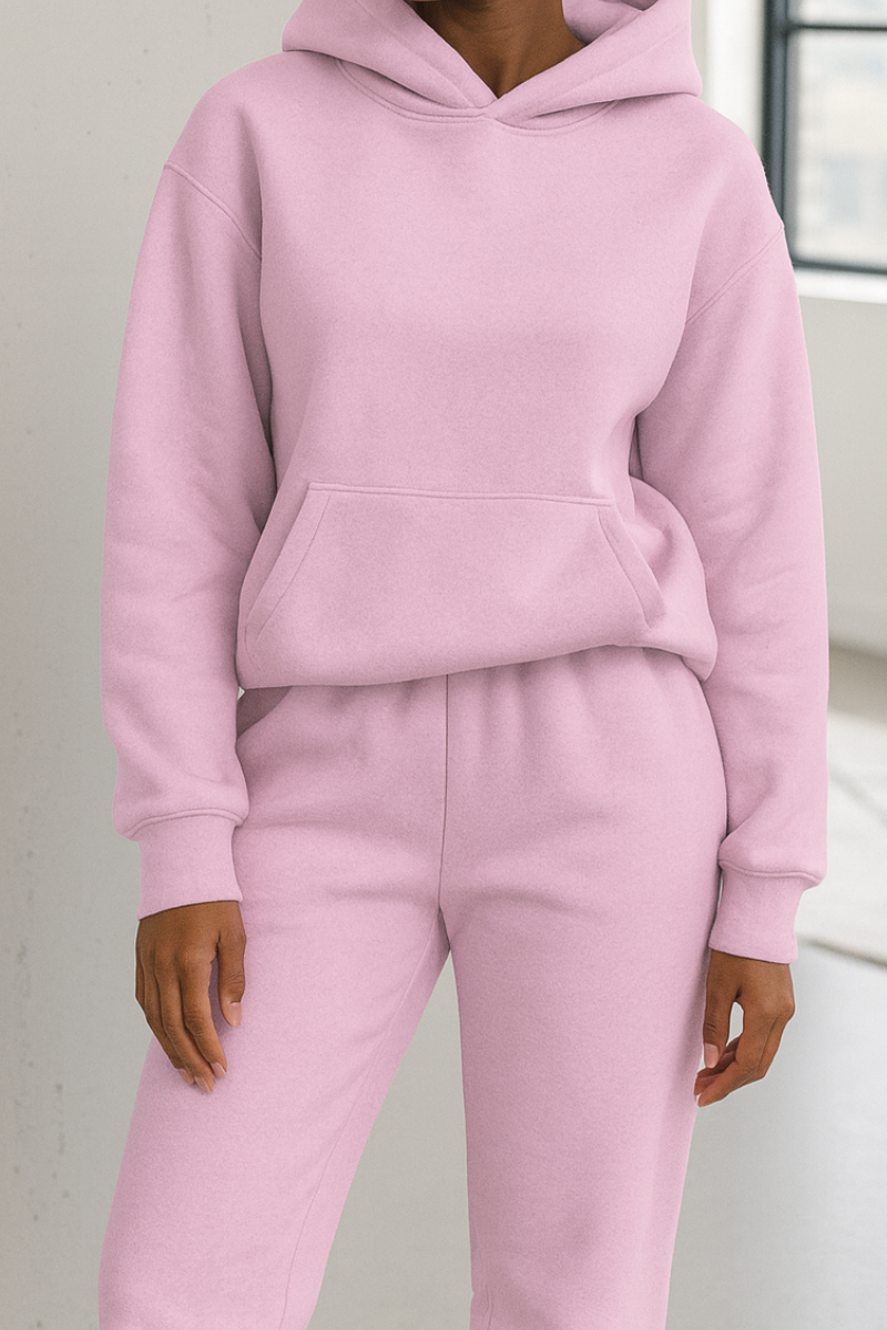 Close-up of women's soft knitted hoodie from two-piece set, upper body detail view
