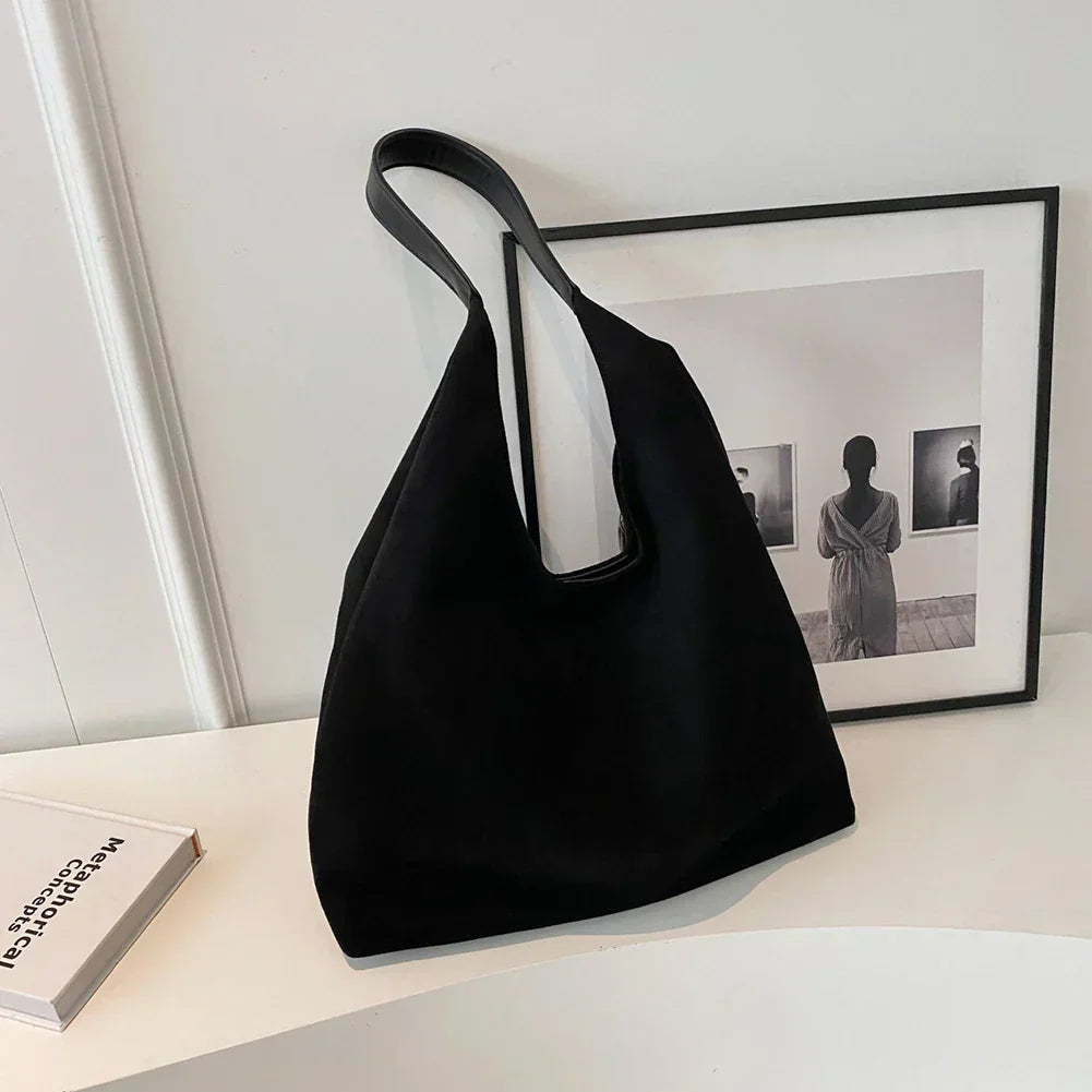 Minimalist tote bag with shoulder strap in a timeless modern design