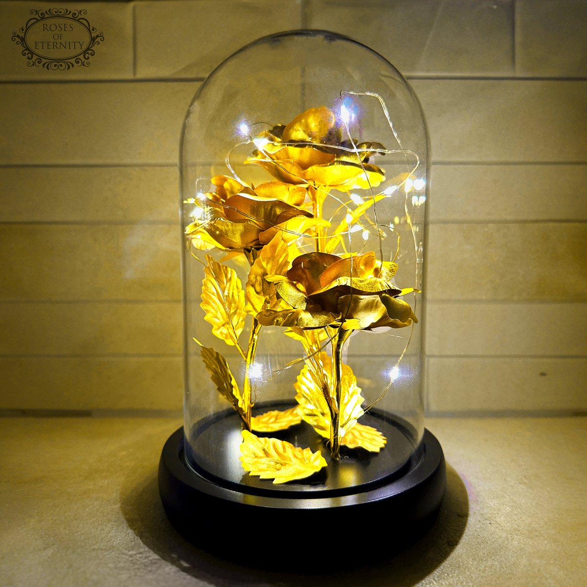 Decorative glass dome with LED flower, suitable as a table centerpiece or gift for home decoration