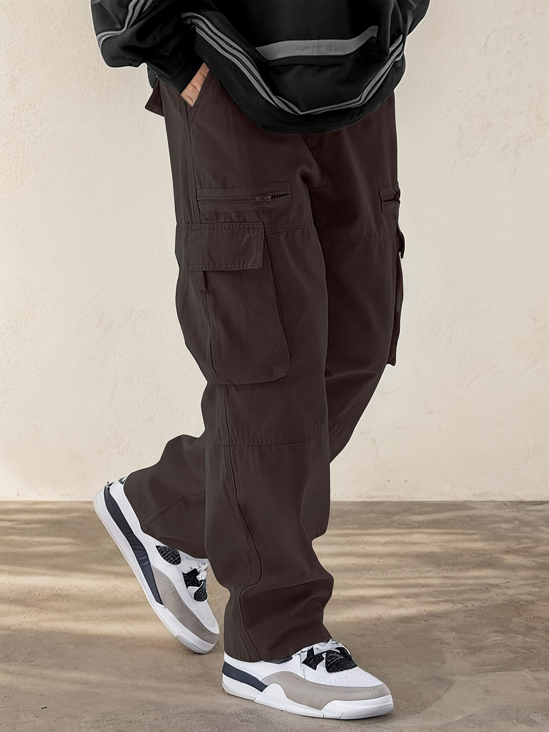 Men's regular-fit cargo trousers with structured woven cotton-blend material and functional side pockets