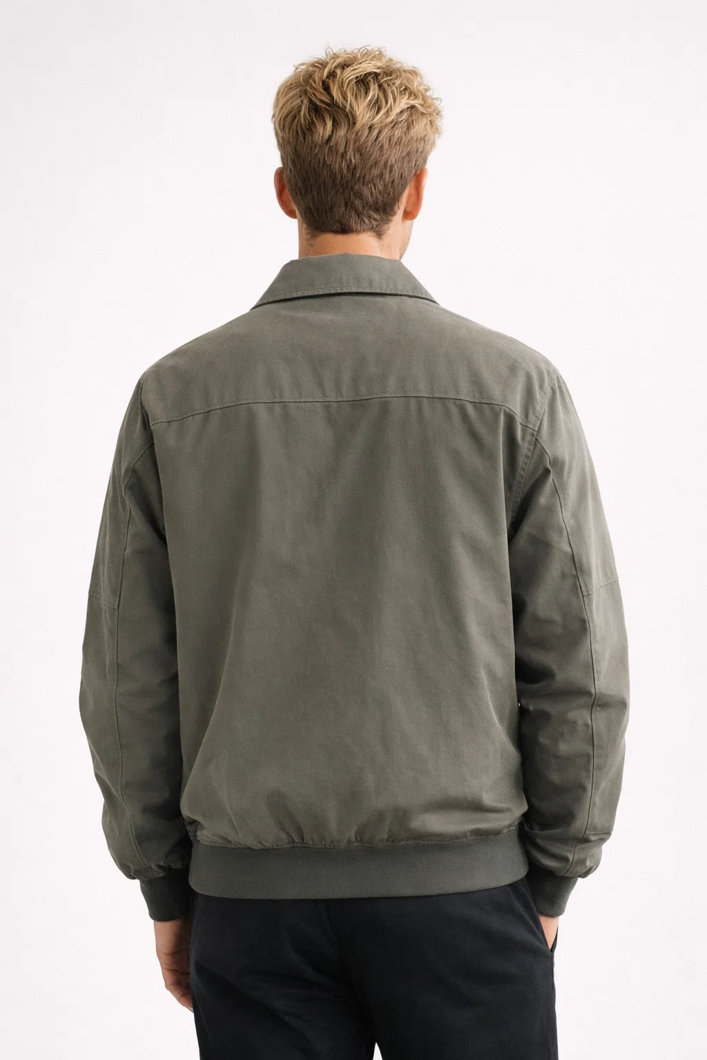 Men's bomber jacket with ribbed hem, long sleeves, and panel construction