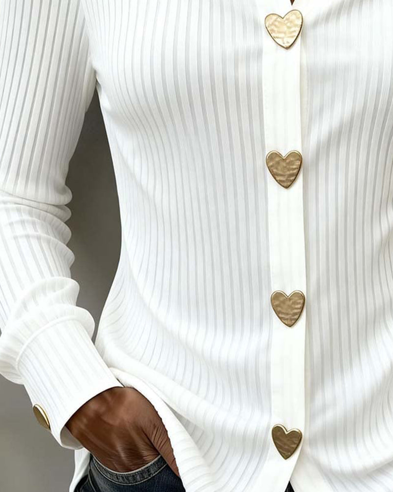 Women's form-fitting ribbed shirt with heart-shaped front buttons and cuffed sleeves