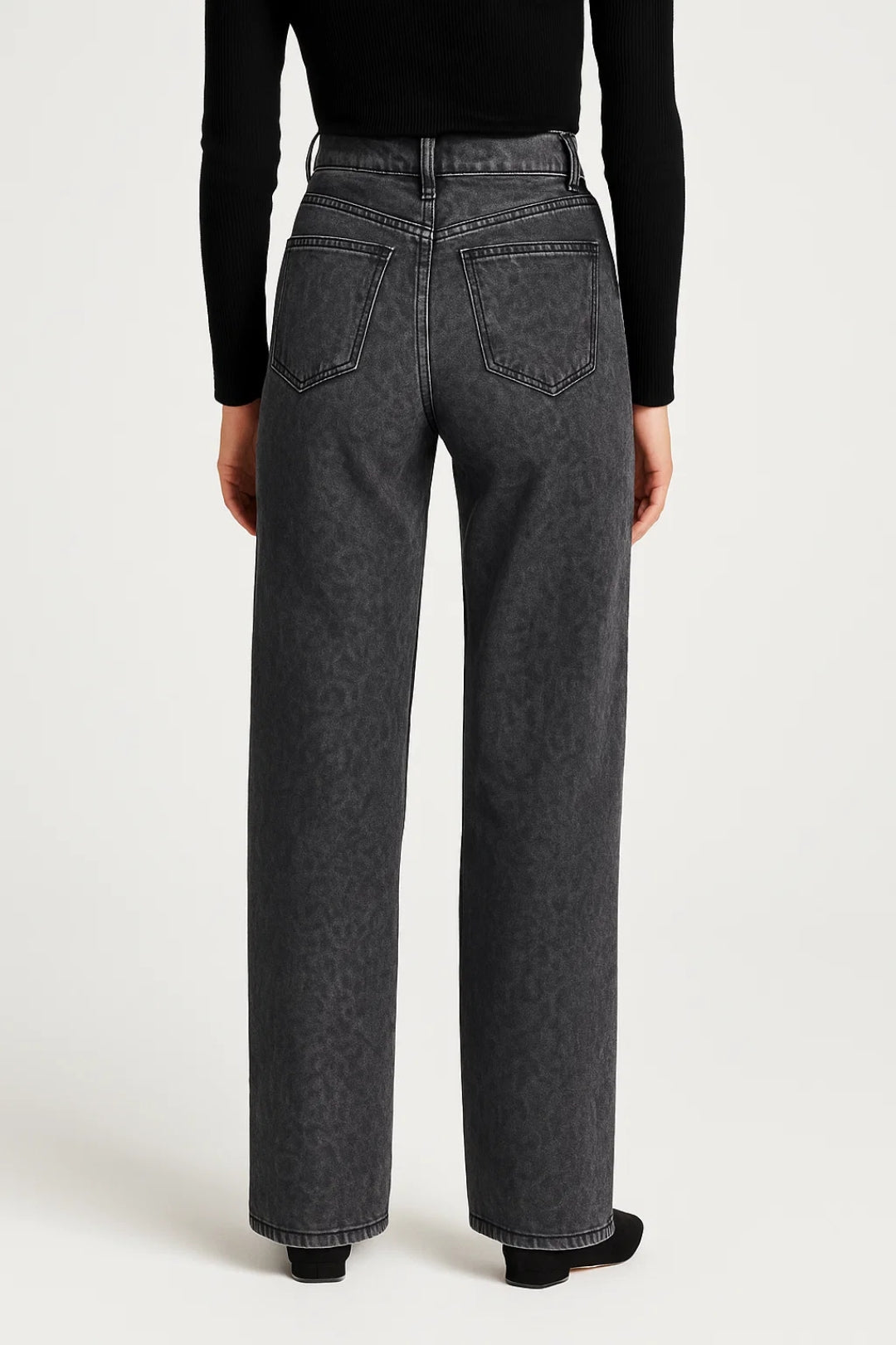 High-waist washed denim jeans for women featuring belt loops, button-and-zipper closure, and straight-leg cut