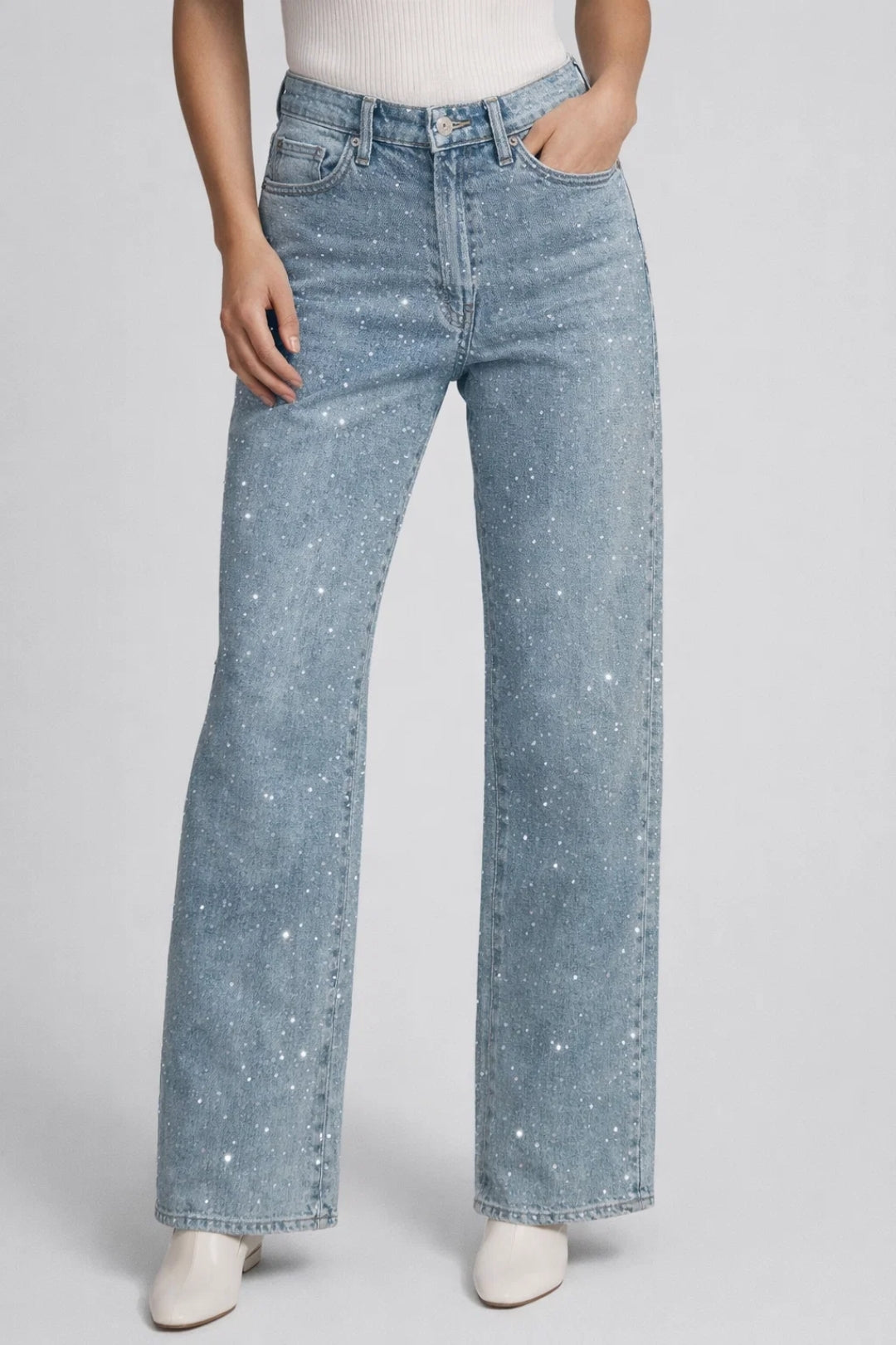 Women's high-waisted straight-leg jeans with rhinestone details and five-pocket construction