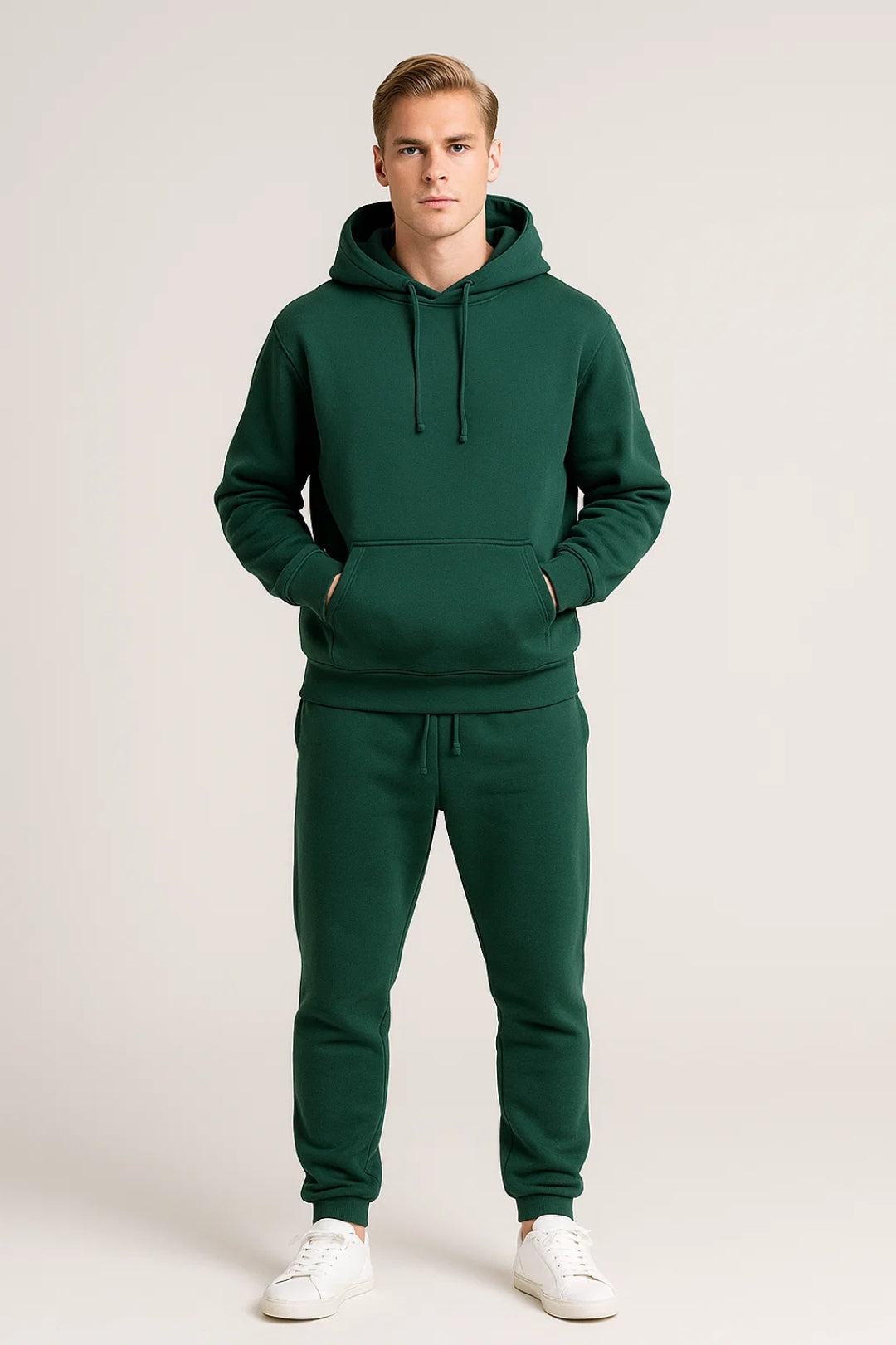 Men's matching hoodie and joggers set featuring a structured hood, front kangaroo pocket, and tapered trousers with elastic drawstring waist