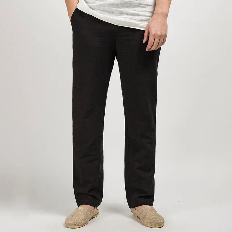 Men's straight-leg linen trousers styled for a relaxed summer look with a structured, full-length silhouette