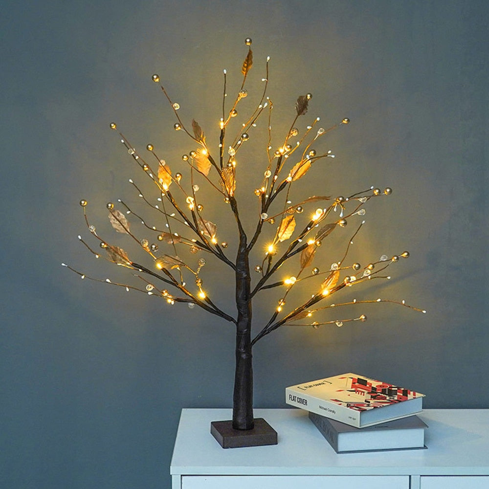 LED decorative fir tree with berries displayed as a freestanding table arrangement