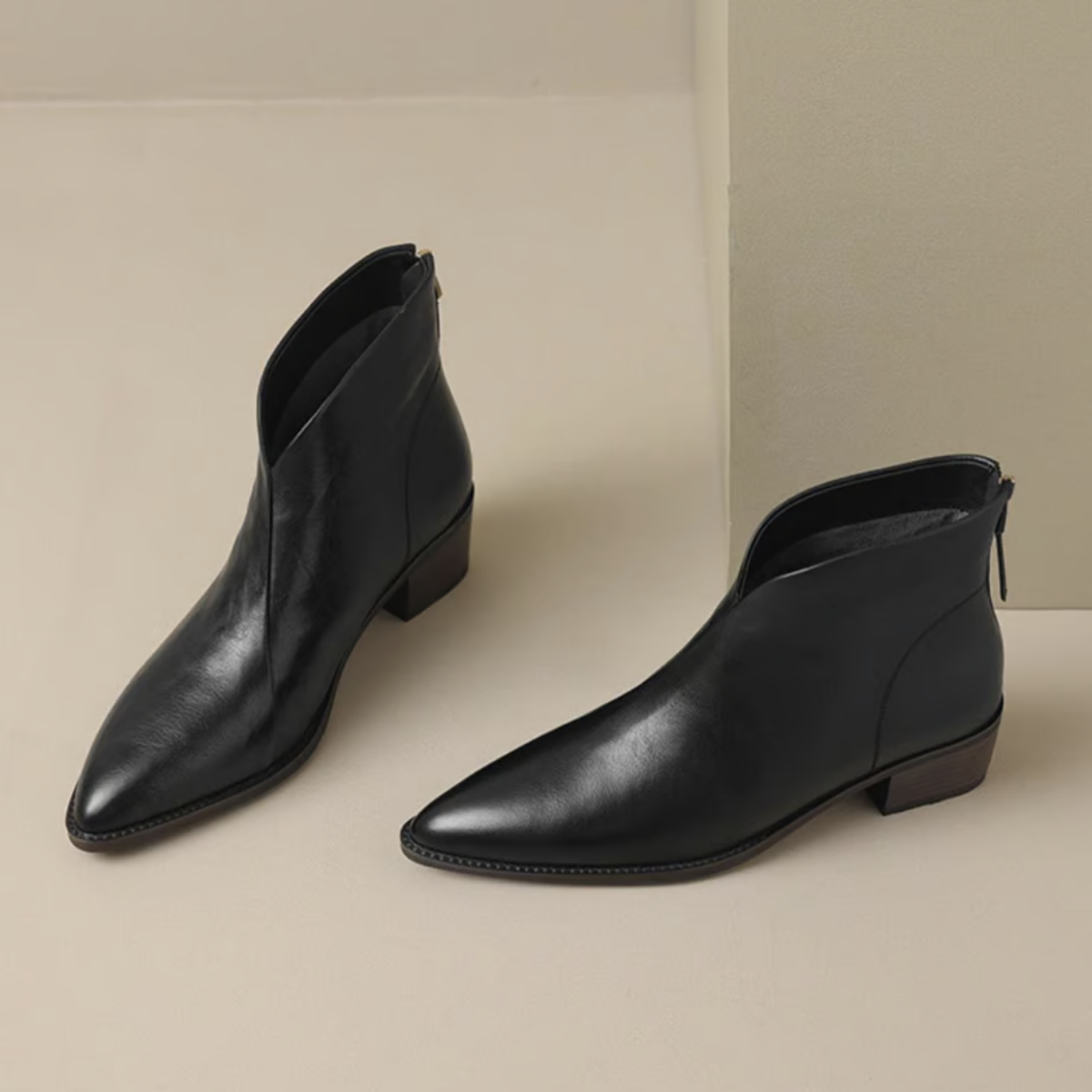 Leather ankle boots for women showing side profile and block heel height