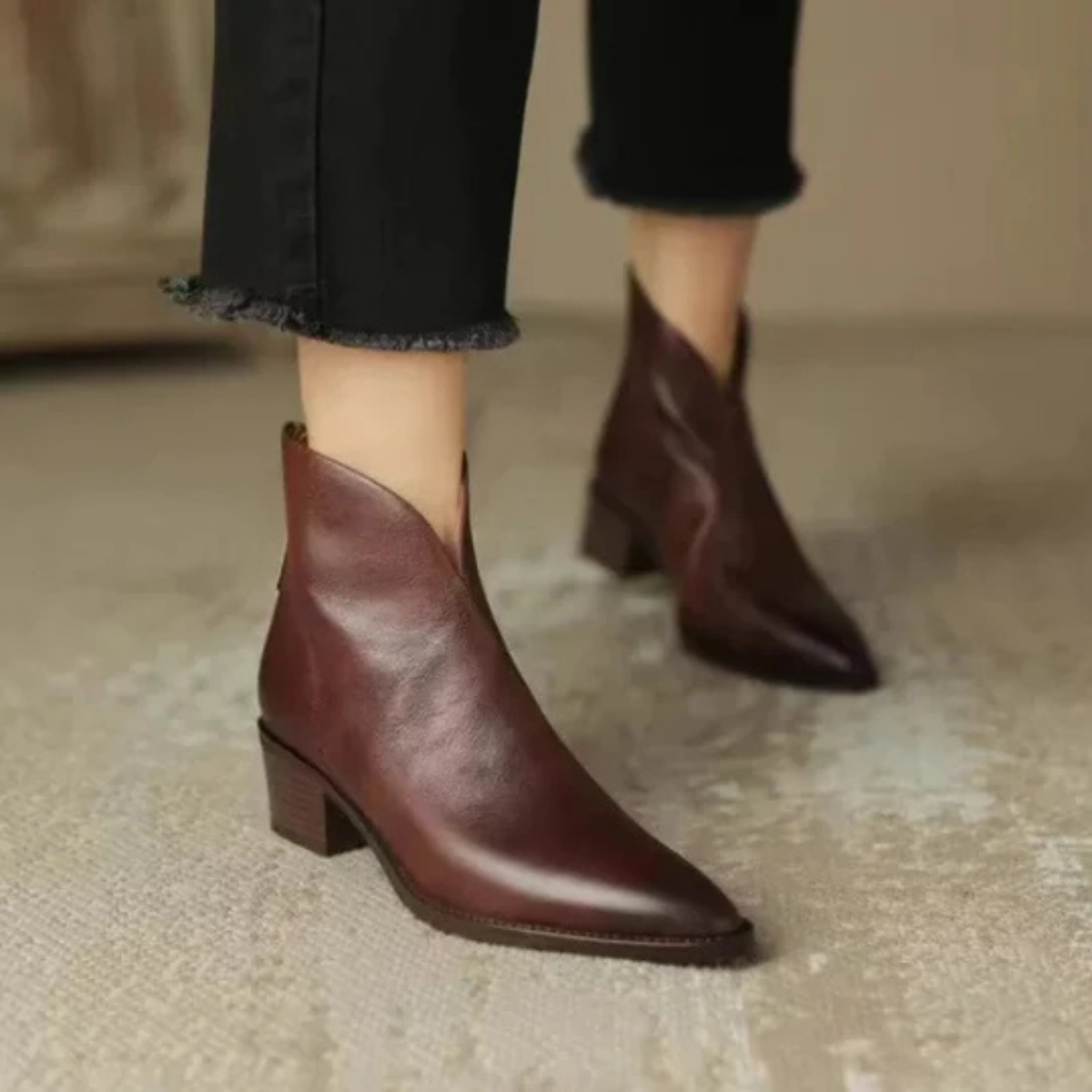 Women's leather ankle boots with block heel, front three-quarter view