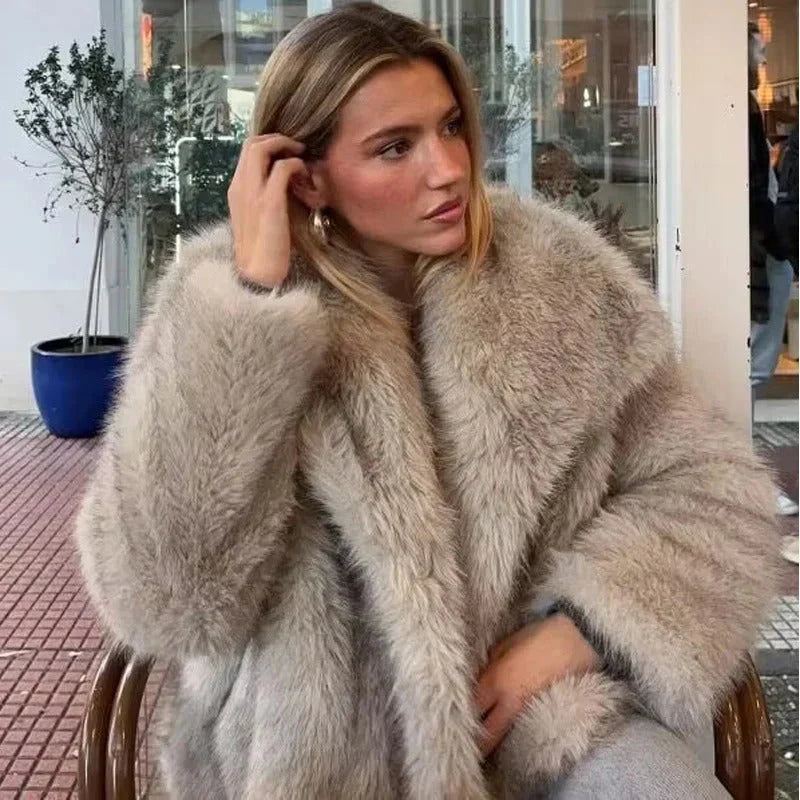 Women's soft faux fur jacket with wide collar and open front, relaxed fit, hip to mid-thigh length