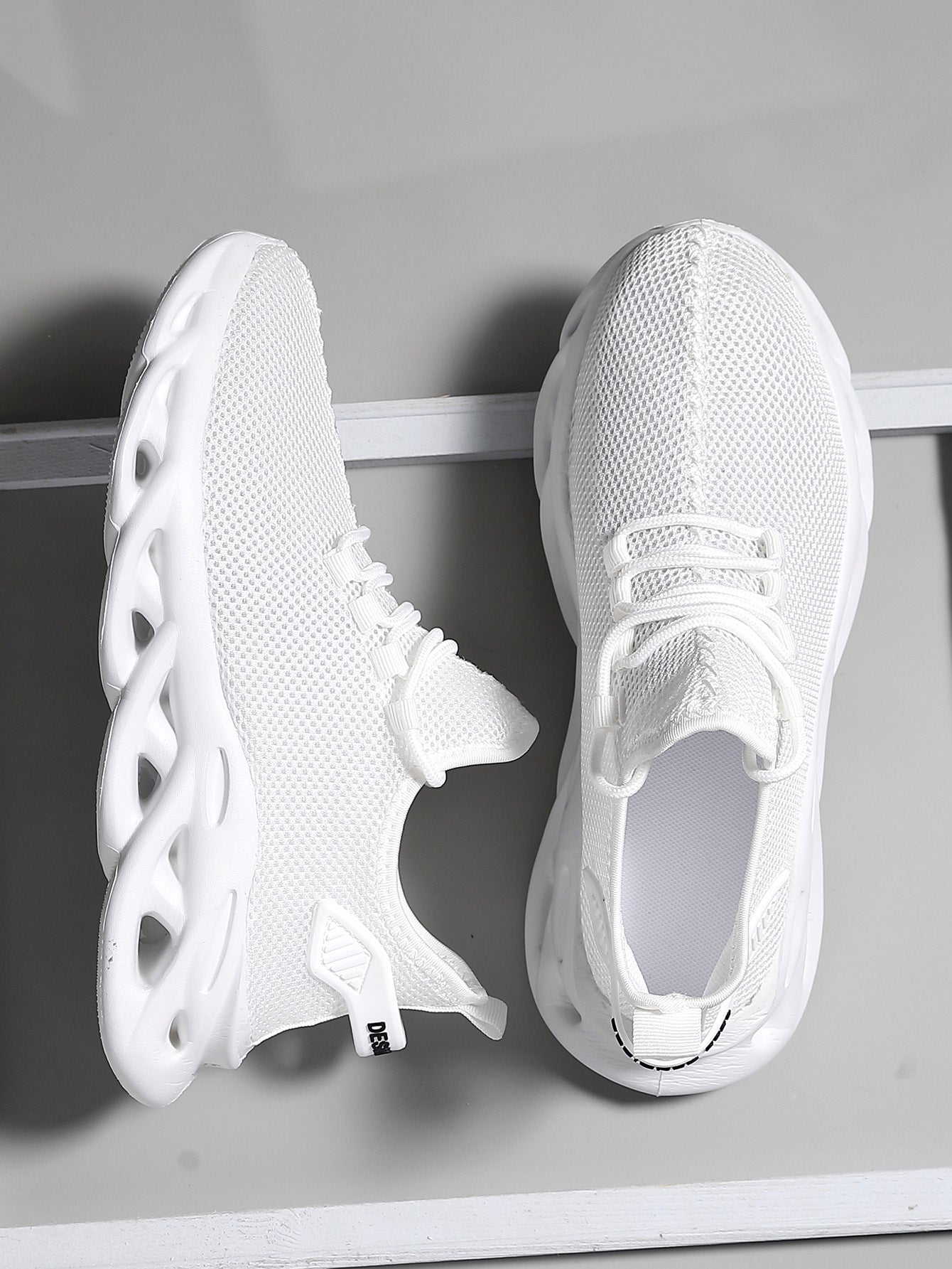 Men's mesh lace-up sneaker with molded synthetic sole, lateral side view