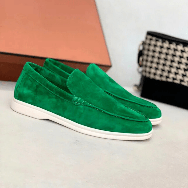 Men's suede loafers front view highlighting the structured toe and smooth suede finish