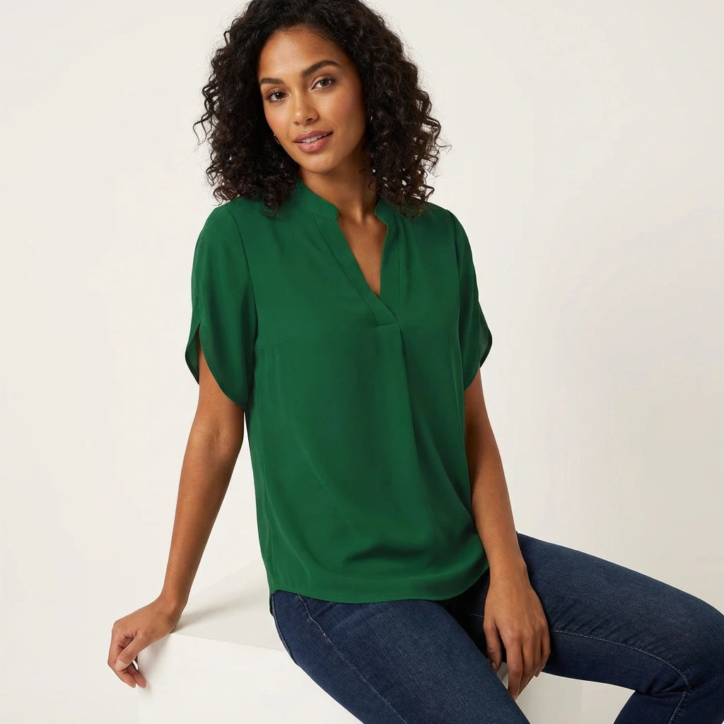 Relaxed-fit women's V-neck blouse with short loose sleeves and straight hem
