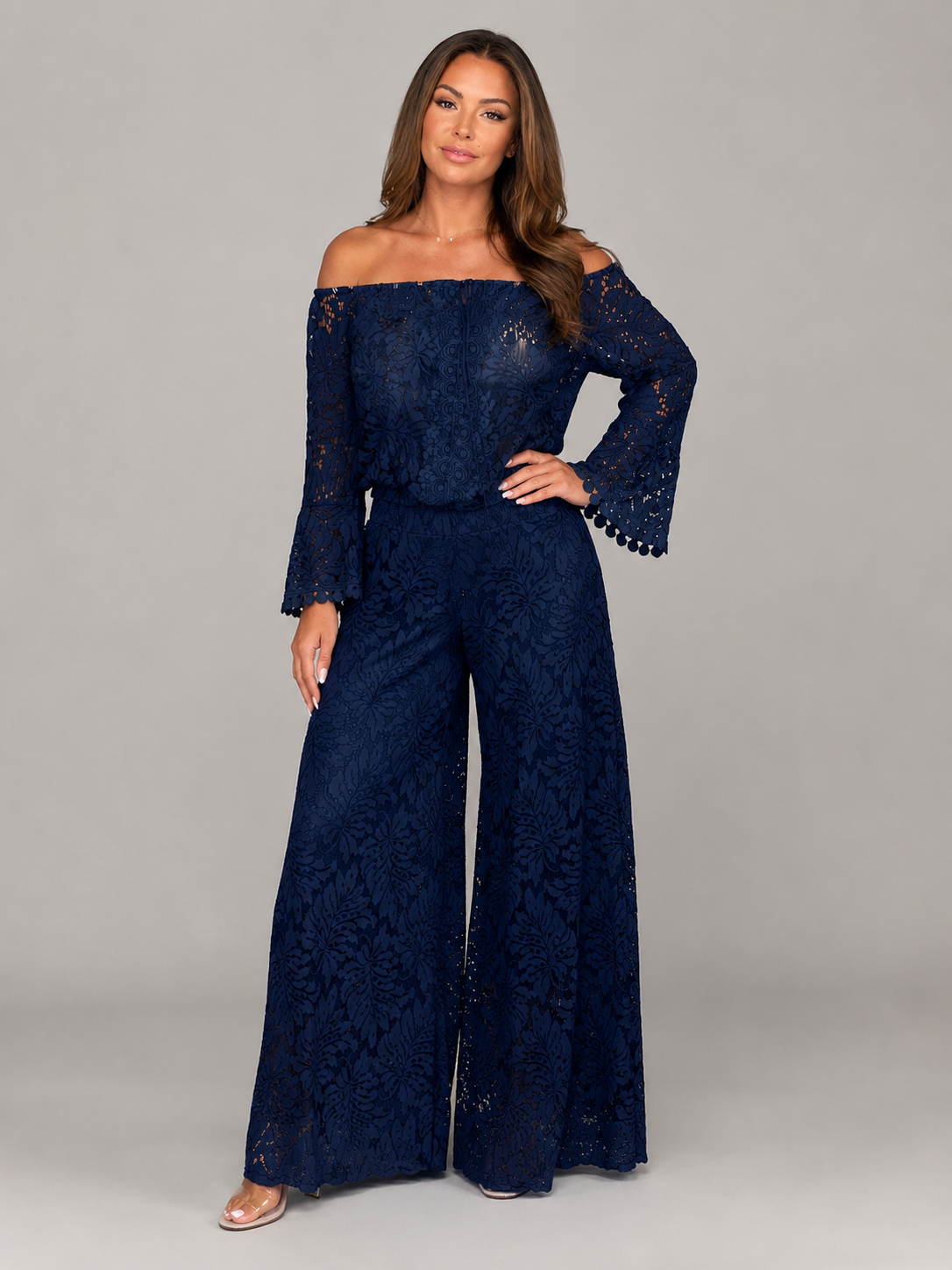 Women's navy blue off-shoulder lace jumpsuit with long sleeves and flared legs