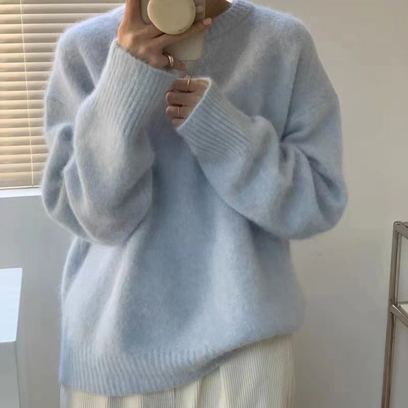 Women's soft knitted sweater showing cuff and sleeve texture detail
