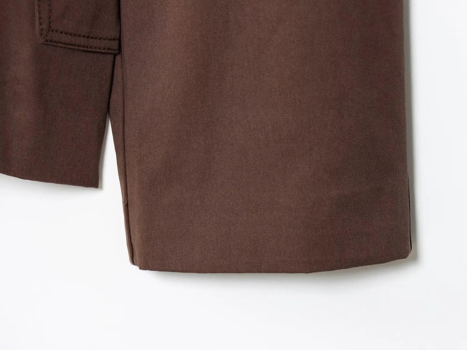 Structured women's jacket with lapel collar and wrap silhouette