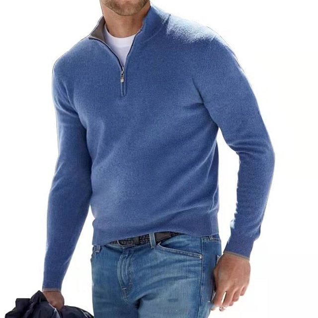 Close-up of the half-zip closure and high ribbed collar on a men's wool-blend sweater