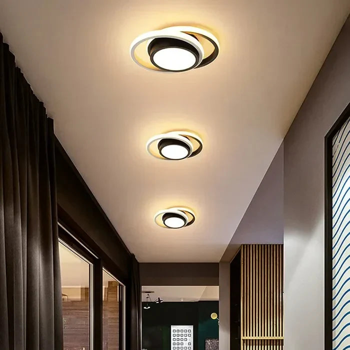Modern LED ceiling light double ring design shown in a living room setting
