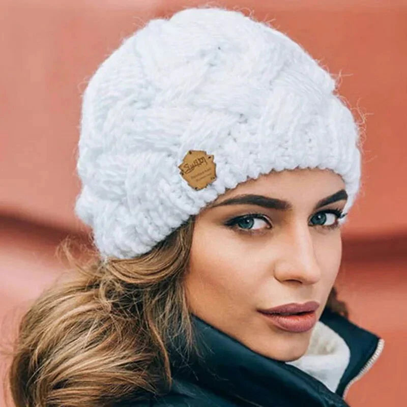 Women's winter knit hat with stretchy one-size fit and warm chunky yarn construction