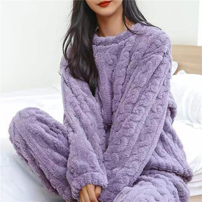 Women's two-piece lounge set with a long-sleeved sweater and matching elastic-waist trousers in a relaxed fit